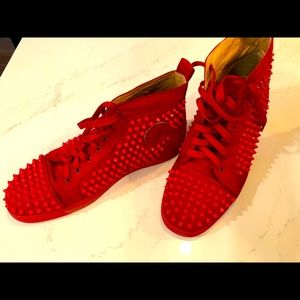 Christian Loubotin red shoes with studs